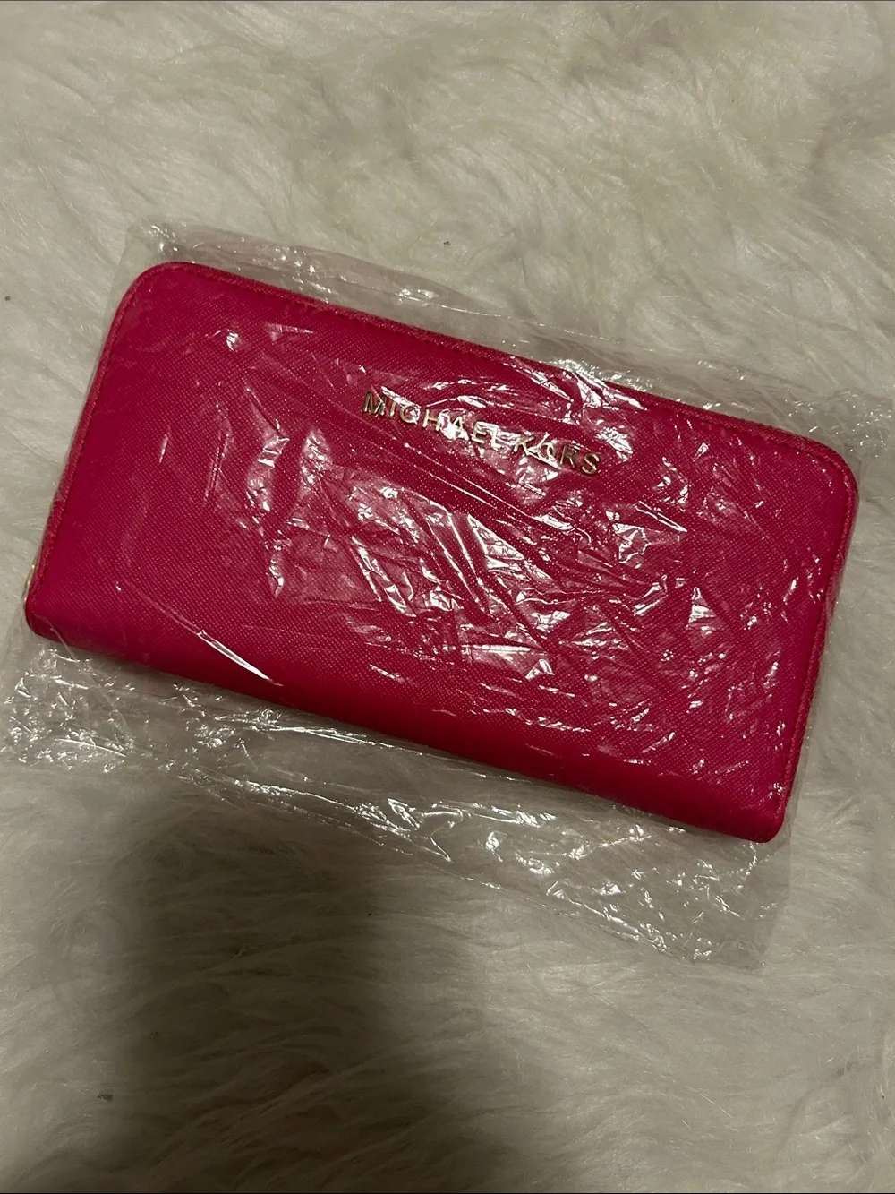 Michael Kors Fuchsia Zip-Around Leather Wallet with Gold Logo